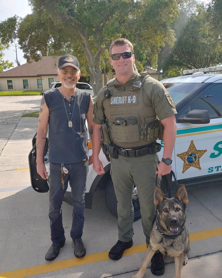 Billy Bob Thornton and a police fan and his dog